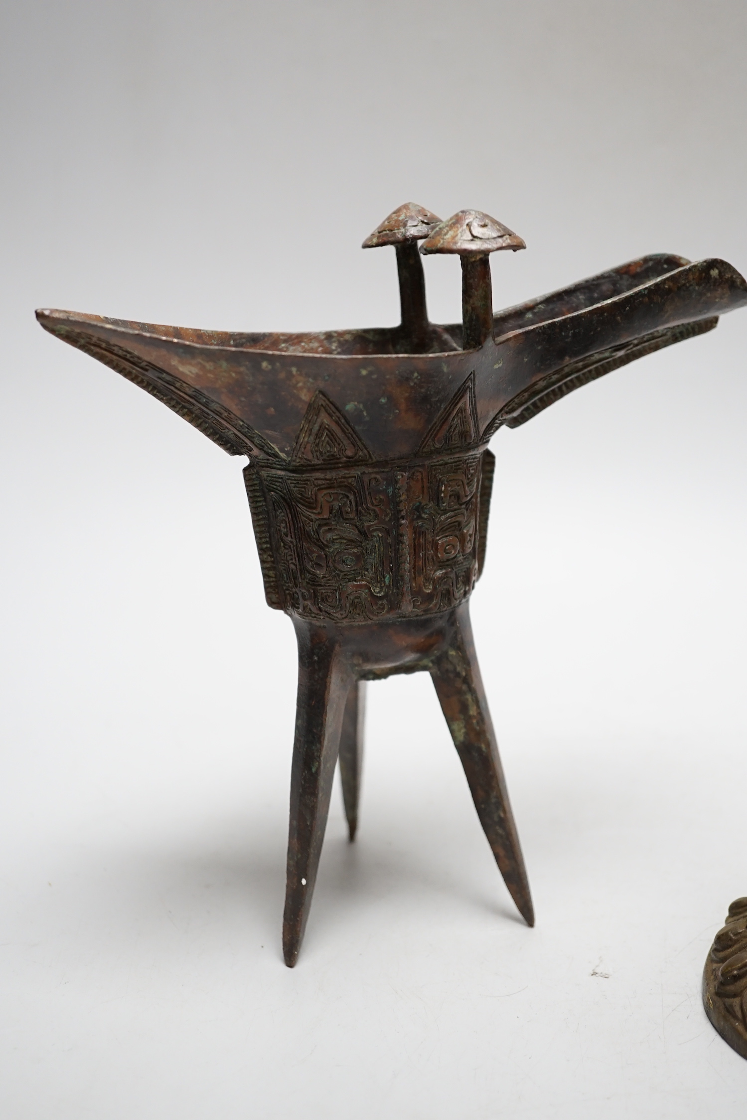 A Buddhist bronze figure and a bronze yi vessel, figure 22cm high